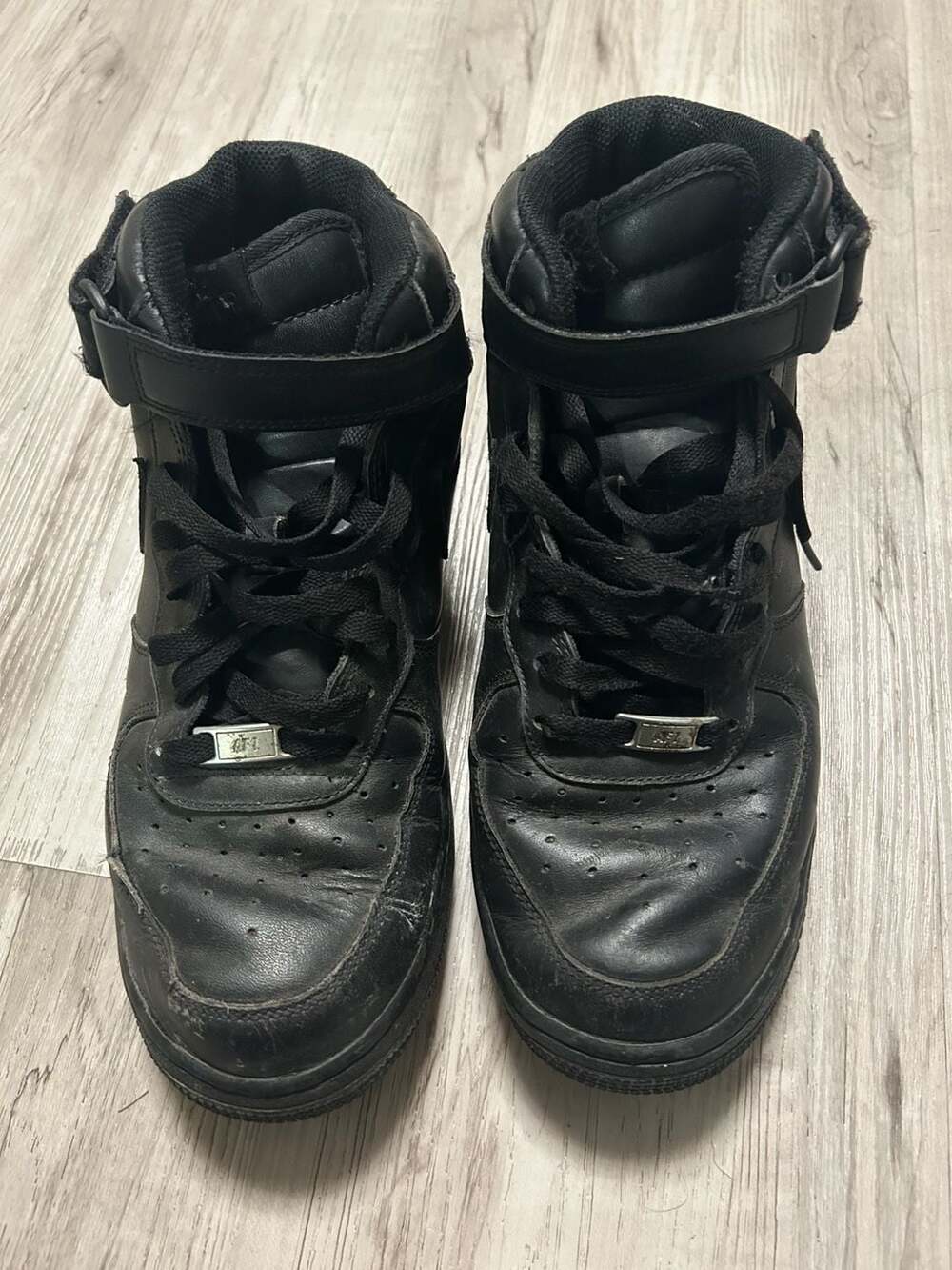 Nike Air Force 1 Mid Black Leather Sneakers
